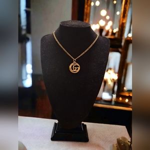 Pendant on stainless steel gold plated necklace